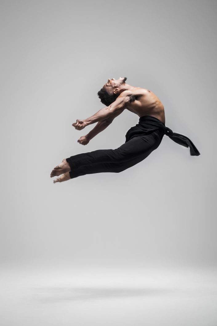 Jerry Metellus dance photography at JM Studios Las Vegas. Ballet photography of Jarrett with an incredible chest first leap.